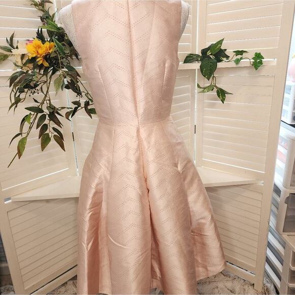 ALEXIS MED PLEATED PINHOLE BLUSH PEPLUM DRESS - Picture 6 of 9